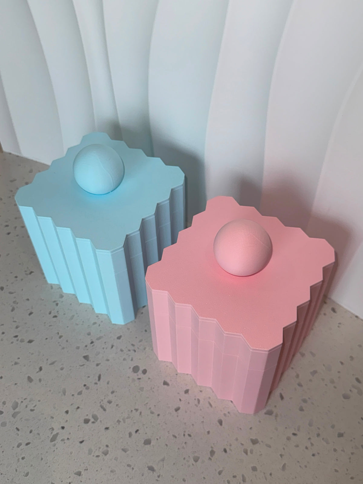 Pantry Collection pink and blue canisters, angled view showing scalloped lids