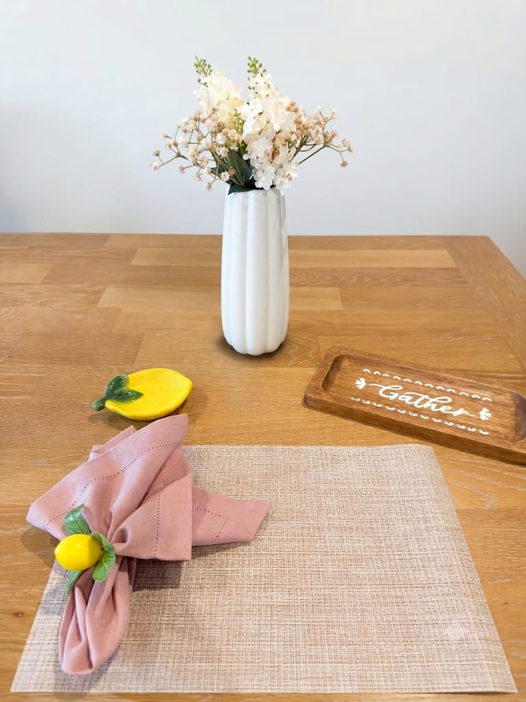 Pink Lemon table setting with vintage pink linen napkin and Sicilian lemon napkin ring