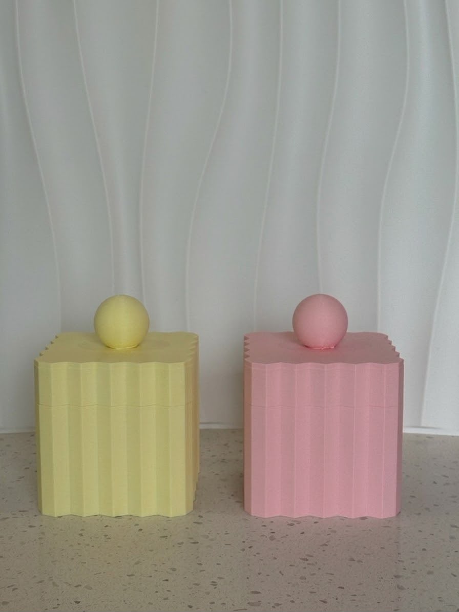 Ripple Canister yellow and pink fluted canisters with ball lids