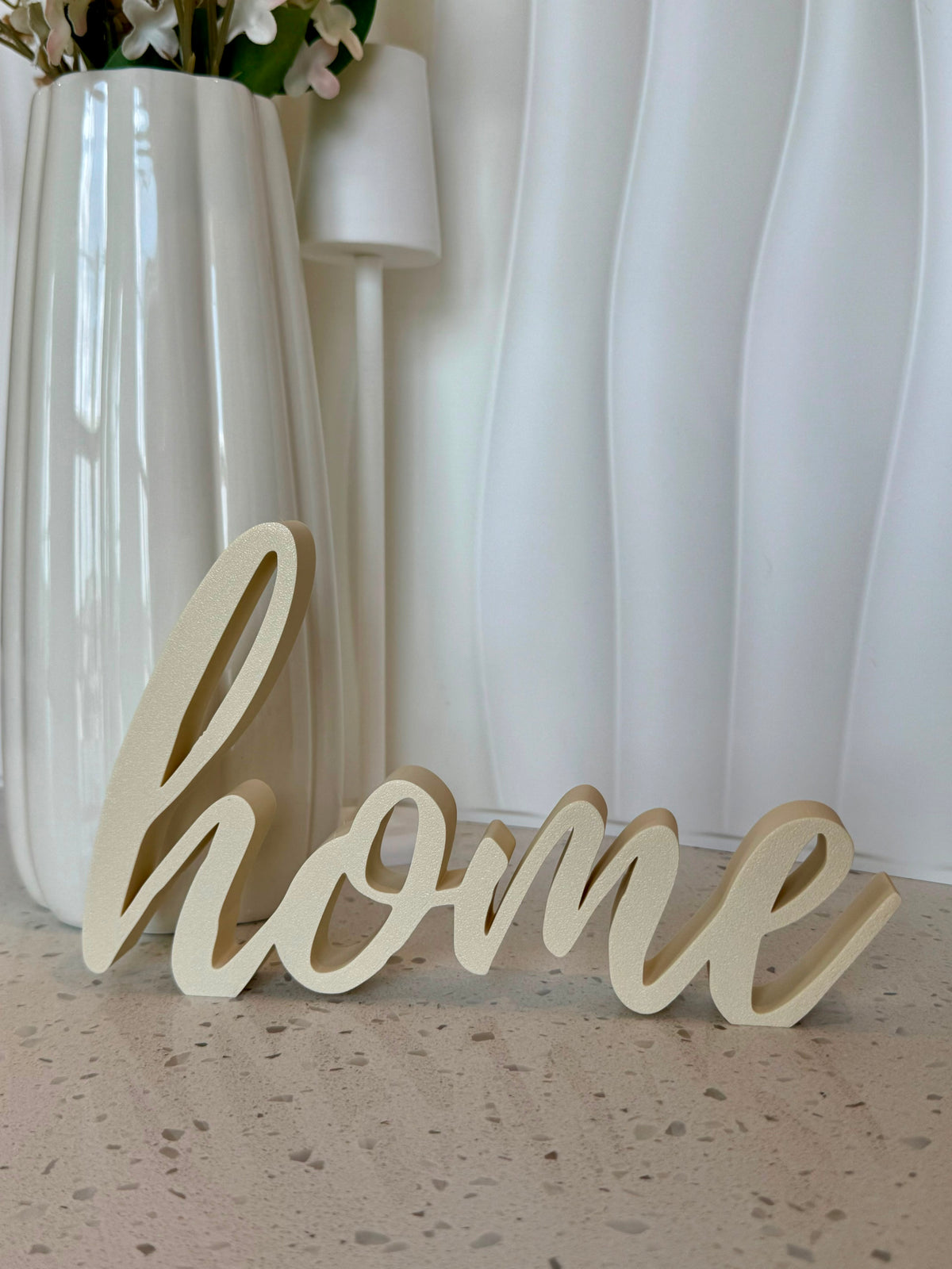 Cream cursive home script sign