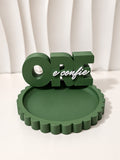 Grace Collection olive green scalloped tray with olive green and white Ore e Confie plaque